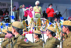 Punjab Health Minister Laxmi Kanta Chawla takes the salute at the march past held at the Sports Stadium in Bathinda on Republic Day.