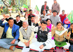 UKD workers stage a dharna in Dehradun on Tuesday