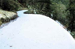 A road covered with snow in Mussoorie on Wednesday