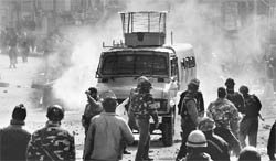 Security forces tackle a protesting mob in Srinagar. The Valley has witnessed several violent clashes involving separatists in recent months