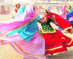 Schoolgirls perform giddha during the Republic Day function at Guru Nanak Stadium in Amritsar