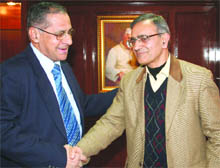 Sudhir Kumar Sopory (R), newly appointed Vice-Chancellor of JNU, being greeted by BB Bhattacharya, outgoing Vice-Chancellor, in New Delhi on Friday.