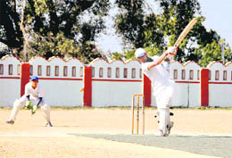 A batsman in action at the Dehradun District Cricket League Tournament in Dehradun on Friday.