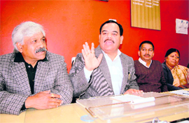 Leader of Opposition Harak Singh Rawat addresses a press conference in Dehradun on Friday.