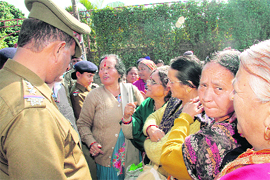 Members of the Uttarakhand Mahila Sadbhawna Manch protest at the civil secretariat in Dehradun on Friday. 