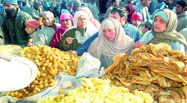 Pilgrims throng the market near the shrine of Saint Sheikh Hamza Makhdoom on the occasion of annual Urs in Srinagar.