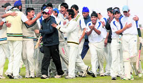 Players of the GNPS cricket team in a jubilant mood after winning the Cremica Cup at the Sector 16 cricket stadium in Chandigarh on Saturday
