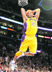 Los Angeles Lakers Kobe Bryant slam dunks against the Sacramento Kings during their game in California, on Friday. 