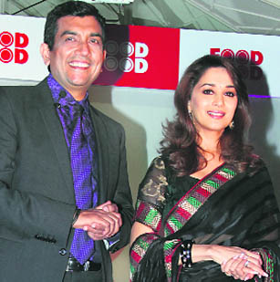 Chef Sanjeev Kapoor with Madhuri Dixit , who is also the lifestyle ambassador of channel FoodFood