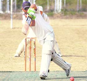 A player in action at the Uttarakhand Twenty20 Cricket League Championship in Dehradun