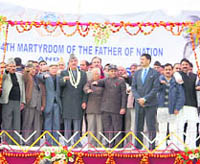 Union Health Minister Ghulam Nabi Azad (centre), along with other Congress leaders, takes the oath at a rally to observe the death anniversary of Mahatma Gandhi in Jammu on Sunday.