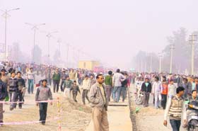 Angry residents of Bhaura village block NH-1 while protesting against the death of a child near Green Land School in Ludhiana