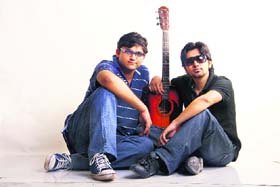 Eshan and Manit, Engineering student, singer, guitarist and e guru