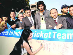 A cricket fan wishes luck to the Indian team ahead of World Cup in Sector 17, Chandigarh, on Monday.