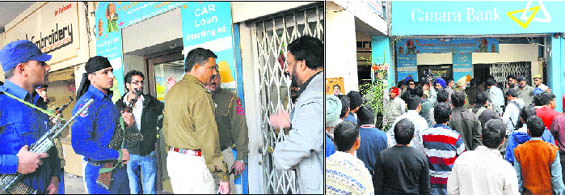 Policemen and commandos keep vigil outside the Canara Bank; and (right) a crowd gathers around the spot at Sector 19 in Chandigarh on Monday.