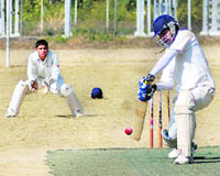 A player in action at the Uttarakhand Twenty20 Cricket League Championship in Dehradun on Monday.