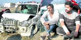 The Scorpio car in which the murder took place; and (right) murder accused Jaideep and Sunny in police custody in Dehradun on Monday.