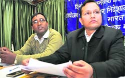 Block Development Officer and programme officer, MGNREGA, Kalsi block, Sushil Dobhal (right) at a workshop in Dehradun on Monday.
