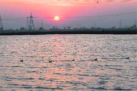 A view of sunset at a village in Karnal district