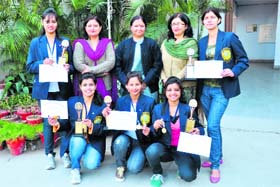 A group photo of the winning orchestra team with principal Jyoti Juneja and other teachers of the college