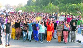 Students raise slogans against the state government at Punjab Agricultural University in Ludhiana