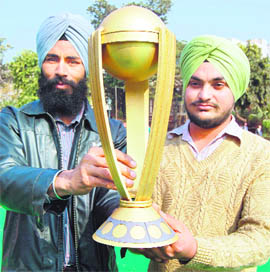 Good luck trophy: Gurpreet Singh and Amritpal Singh wish the Indian cricket team best of luck ahead of the World Cup in Amritsar