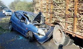 The mangled remains of a car after it collided with a loaded tractor-trolley on the Barnala road in the Bathinda cantonment area on Tuesday.