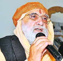 Surinder Muni addresses a press conference in Dehradun on Tuesday. A Tribune photograph