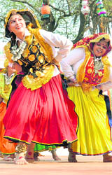 Artistes from Haryana present a folk dance during the inauguration ceremony of the Surajkund Crafts Mela in Faridabad on Tuesday.