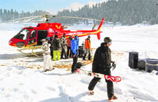 Foreign tourists at Gulmarg where heli-skiing was started on Tuesday. 