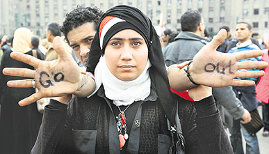 An engaged Egyptian couple join thousands of others as they gather in Cairos Tahrir Square heeding a call by the opposition for a march of a million calling for the ouster of Hosni Mubarak's regime on Tuesday.