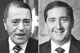 Newly appointed Jordanian Prime Minister Marouf Bakhit (left) and outgoing premier Samir Rifai.