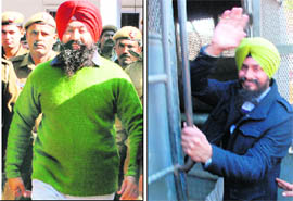 Paramjit Singh Bheora (left) and Jagtar Singh Hawara being taken to court in Chandigarh on Wednesday.