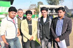 (2nd from right) Rahat Kazami, writer and director, with his team members after addressing mediapersons in Jammu on Wednesday. 