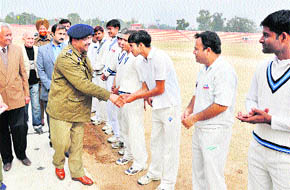 Dilbag Singh, IGP, Jammu zone, shakes hands with the participants of the 5th North Zone Cricket Tournament for hearing impaired persons organised by the JK Association of the Deaf in collaboration with the J&K Police at the MA Stadium in Jammu on Wednesday.