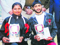 Anita and Jaskaran with their trophies at Government Mohindra College in Patiala on Thursday. 