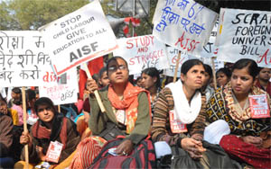 Members of the All-India Students Federation protest against alleged undemocratic education bill proposed by the Centre and USAs inhuman behaviour with Indian students, in New Delhi on Thursday.