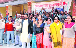 Activists of the Uttarakhand Rajya Andolankari Manch hold a protest at the City Magistrates office in Haridwar on Thursday. 