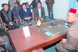 A delegation of the Tibetan government meets Chief Minister Prem Kumar Dhumal at Dharamsala