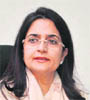 Minister Kiran Choudhry in her office on Thursday. 