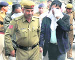 An accused outside a Karnal court. 