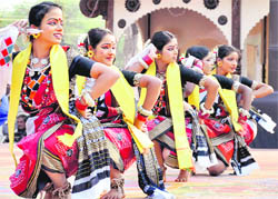Artistes from Orissa perform a folk dance during the Surajkund Crafts Mela in Faridabad on Wednesday.