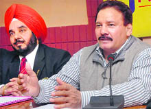 DIG Kartar Singh (right) briefs the media on Shaheed Bhagat Singh International Wrestling Tournament, to be held on February 10, in Jalandhar on Thursday