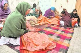 Jail inmates doing embroidery on shawls in Ludhiana