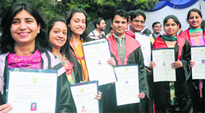 Students with their degree during the 31st Convocation of the PGIMER in Chandigarh on Friday.