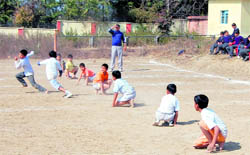 Boys take part in a kho-kho match during a cluster-level sports meet at Kendriya Vidyalaya No. 1 in Dehradun on Friday