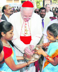 Pope Benedict XVIs special representative Cardinal Cormac Murphy O Connor being welcomed in Ranchi on Friday.