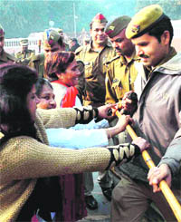 Women workers of Samajwadi Party during a protest against rising incidents of atrocities against women in Lucknow on Friday.