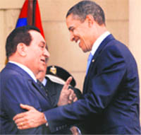 Egypt's President Hosni Mubarak (L) welcomes US President Barack Obama at the presidential palace in Cairo in this file photograph