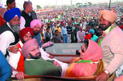 PPCC president Captain Amarinder Singh and Leader of Opposition in Punjab Assembly Rajinder Kaur Bhattal along with other senior Congress leaders at the party rally held in Moga